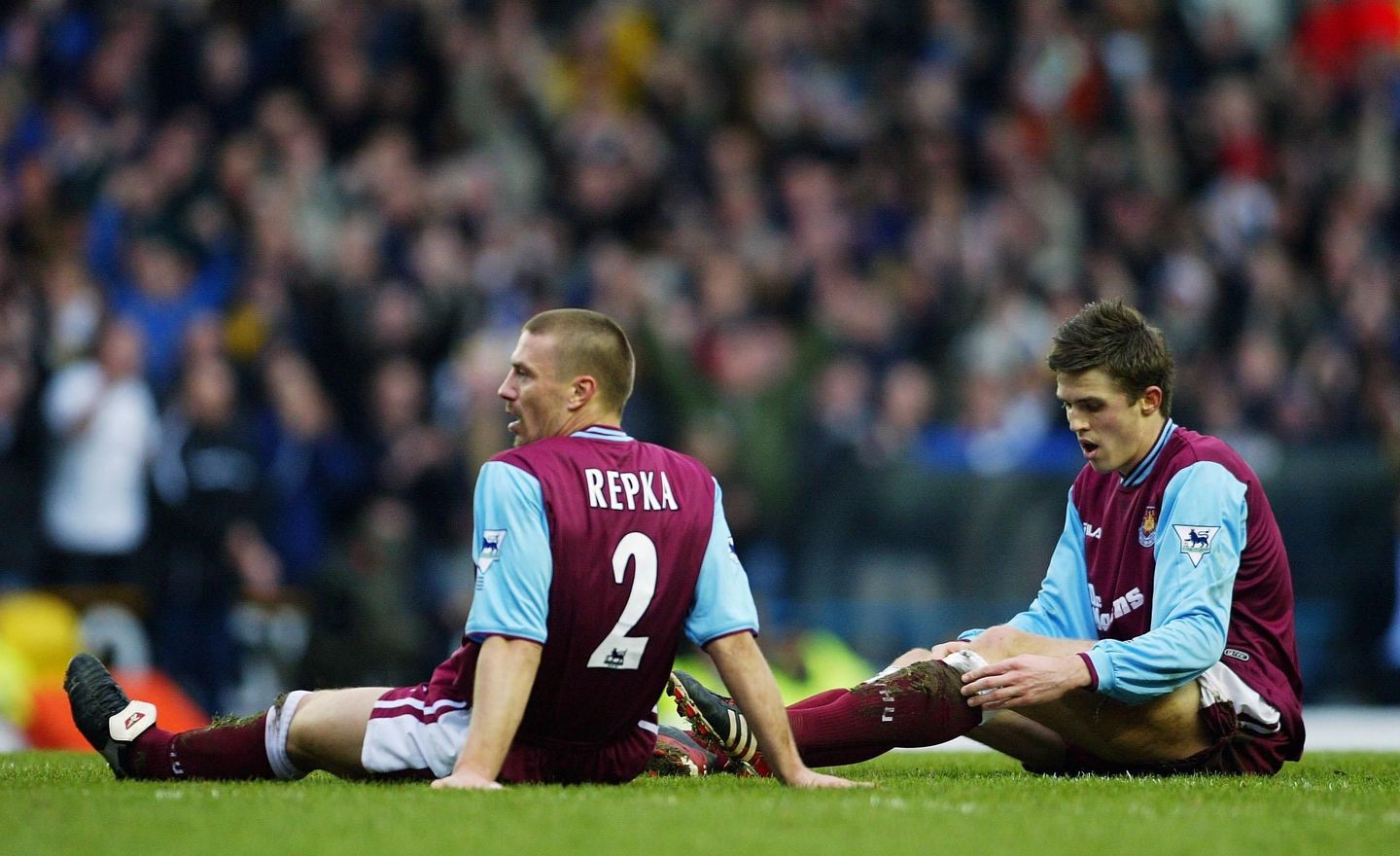 West Ham's Tomas Repka and Michael Carrick look dejected