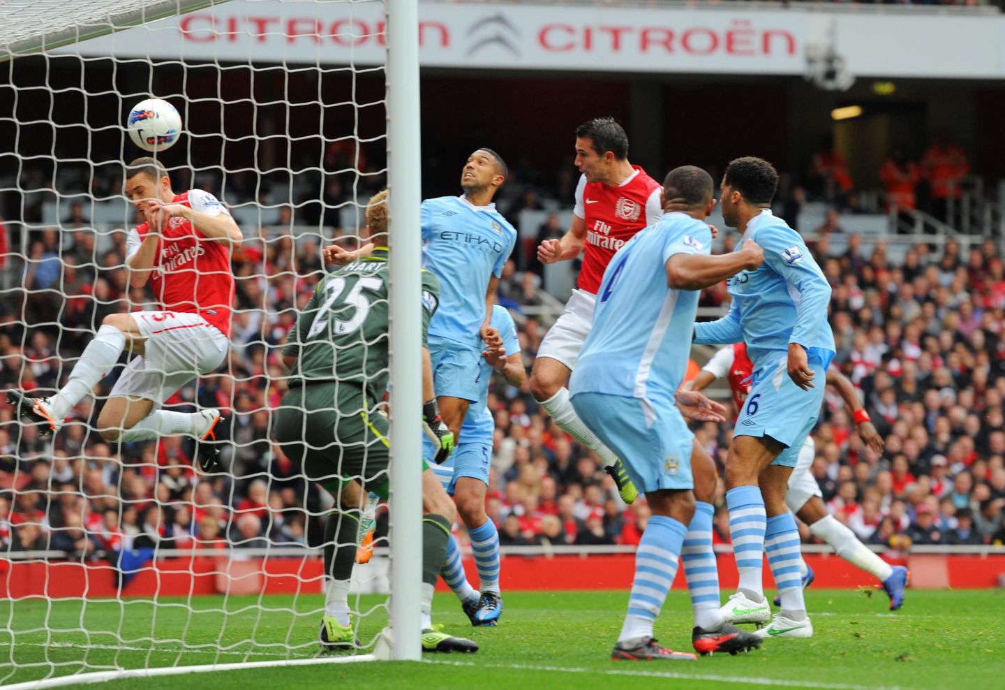 ARS-2011-12-robin-van-persie-header-blocked-thomas-vermaelen-scramble-goal-line