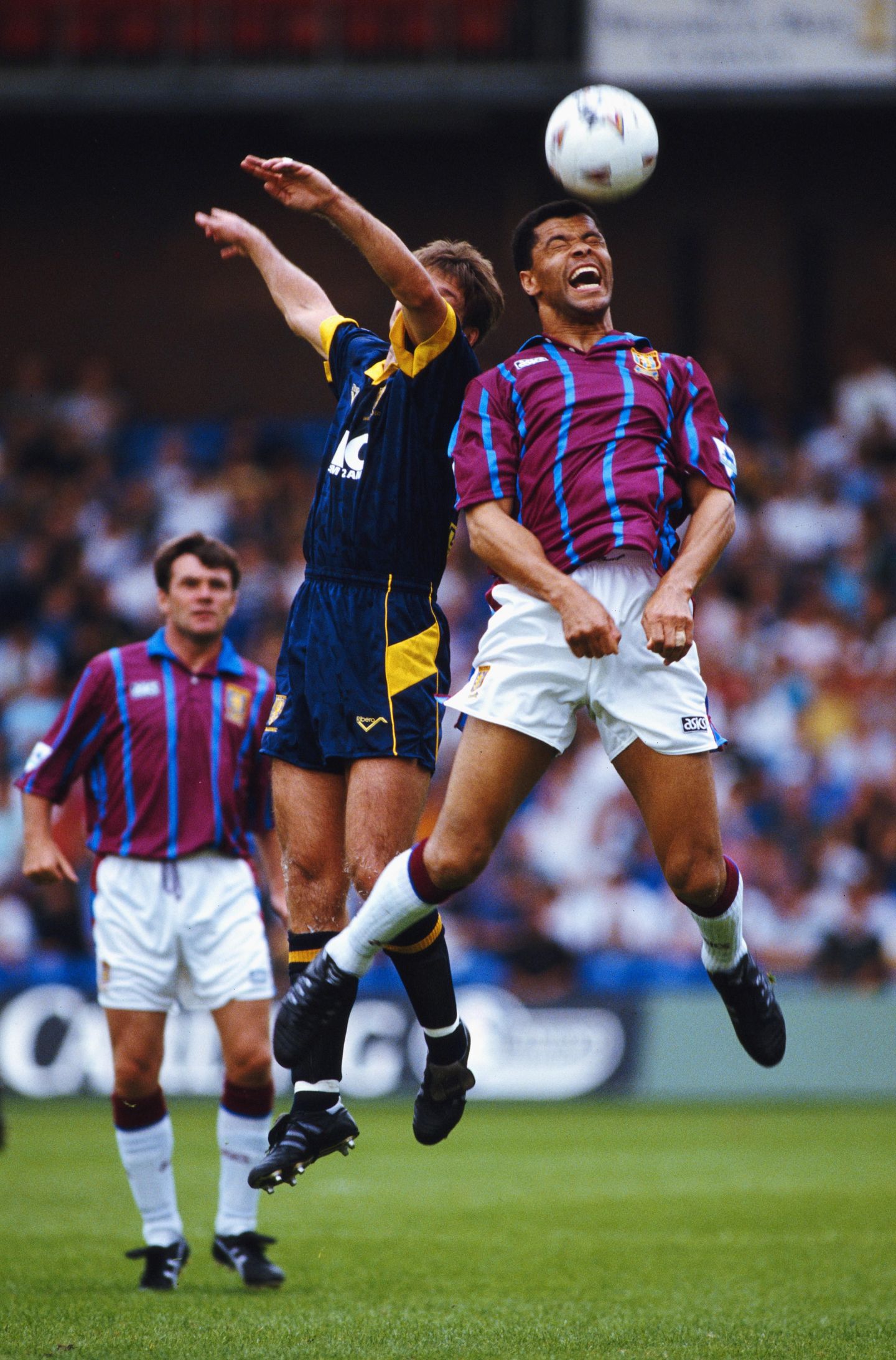 Paul McGrath wins a header for Aston Villa