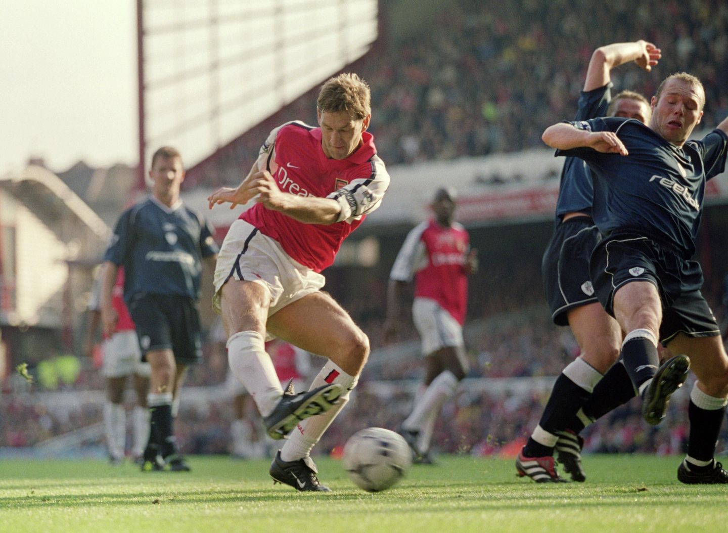 Tony Adams has a shot on goal against Bolton