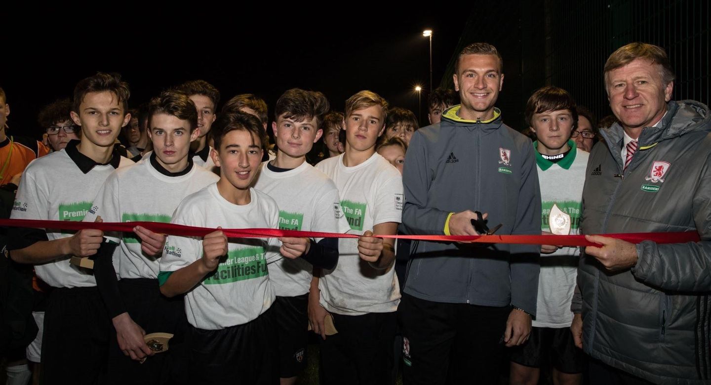 Ben Gibson cuts ribbon.JPG