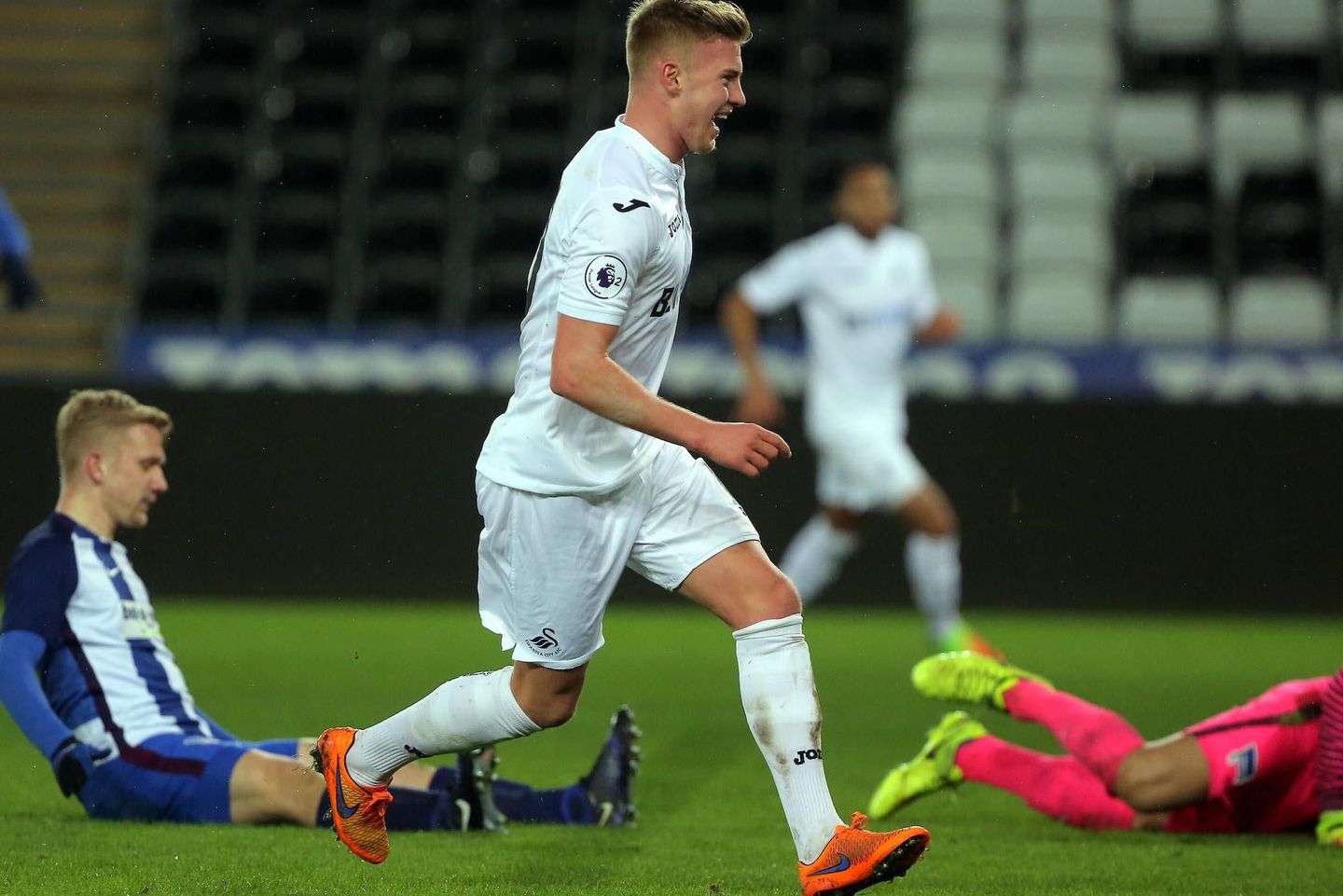 Adam King celebrates scoring for Swansea