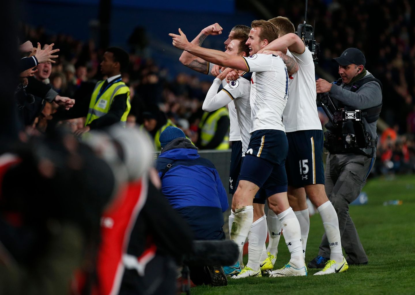 Tottenham's Christian Eriksen celebrates scoring their first goal with Harry Kane and teammates