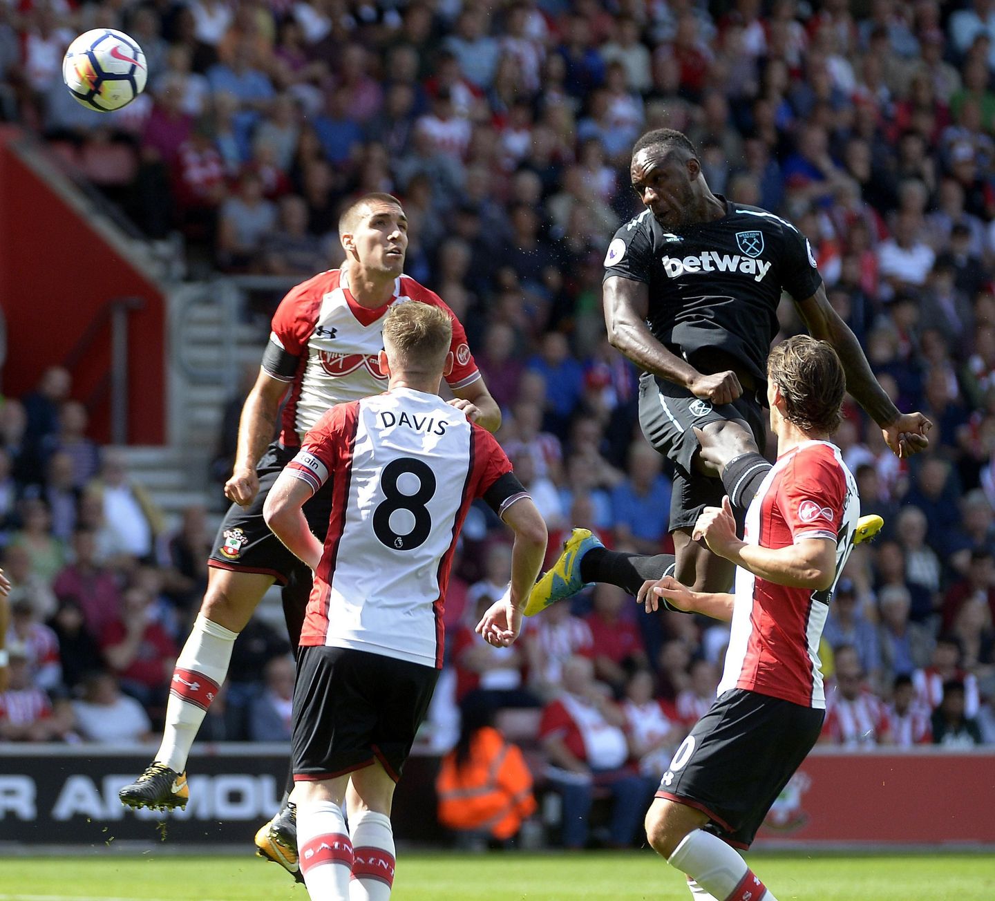 West Ham's Michail Antonio heads the ball against Southampton