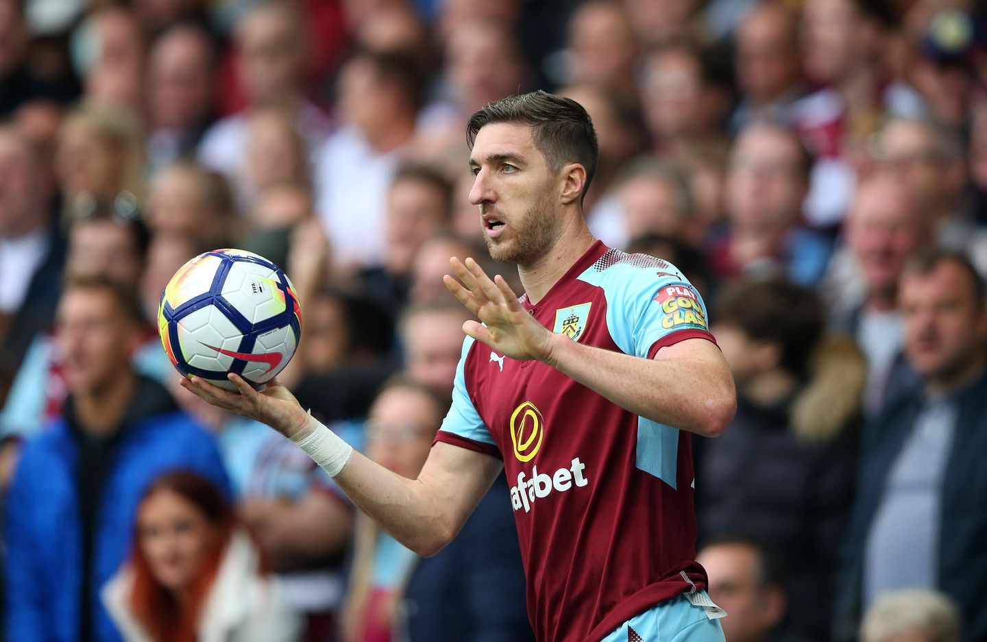 Stephen Ward takes a throw-in against Everton