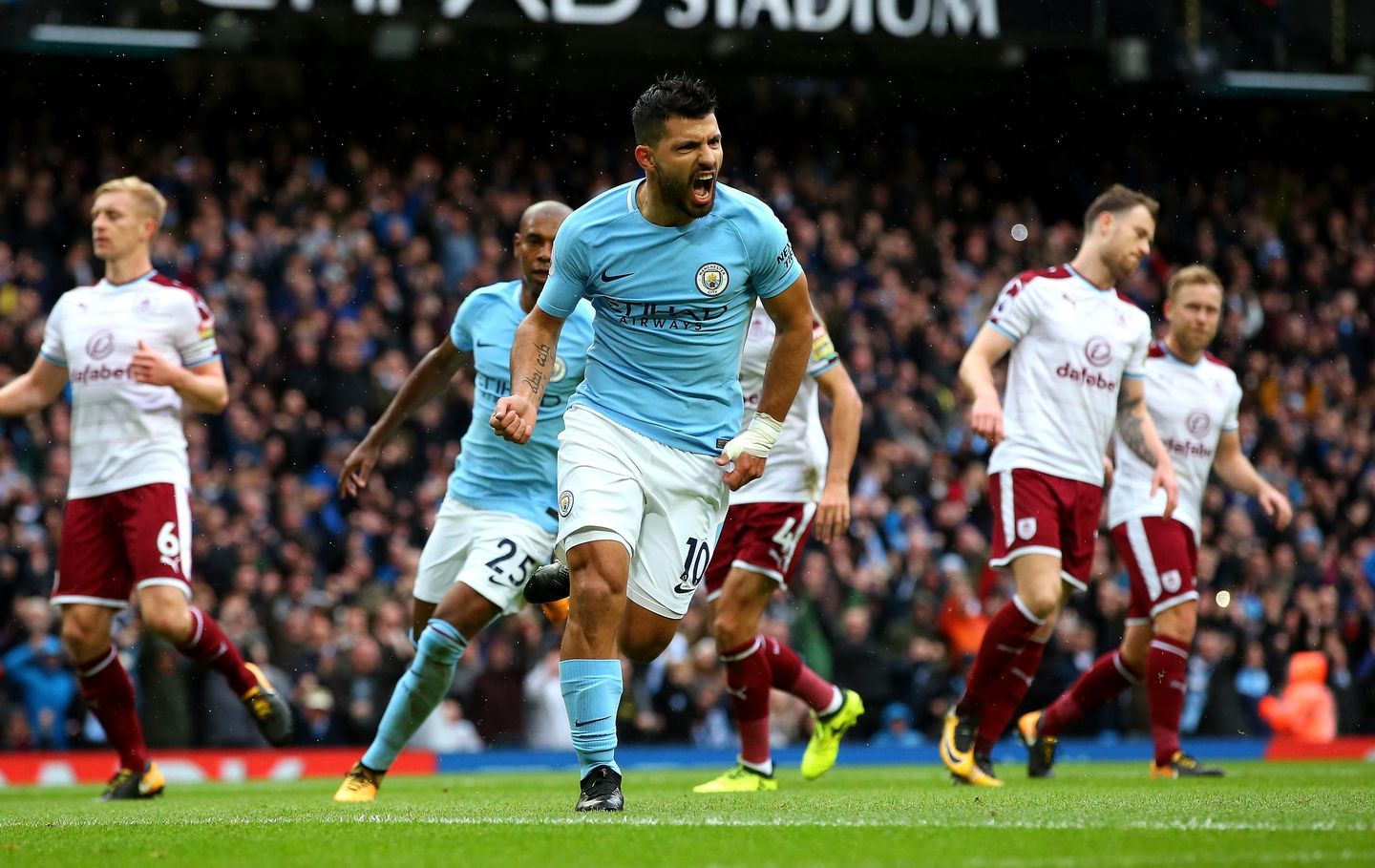 Manchester City striker Sergio Aguero celebrates scoring against Burnley