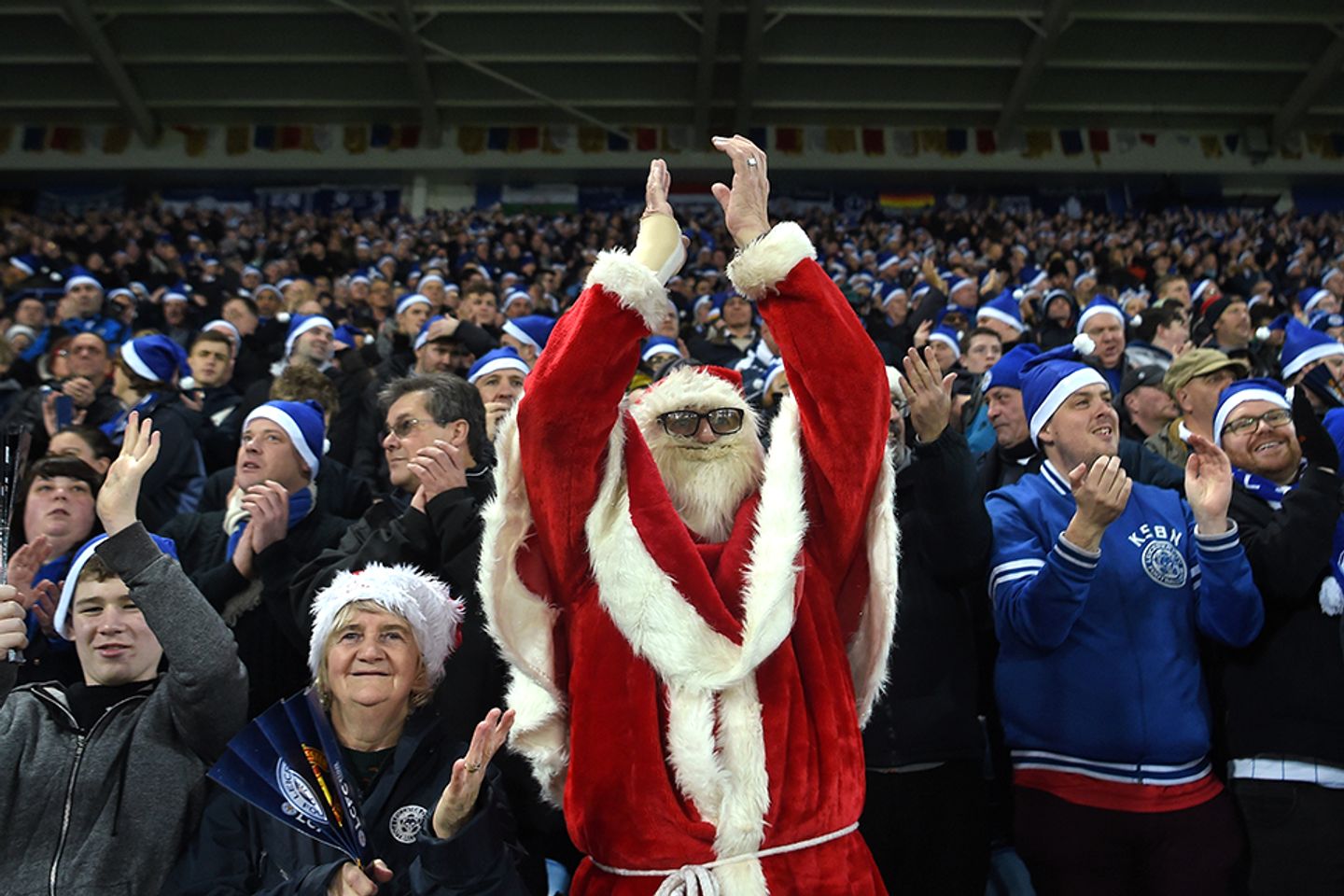 A fan in fancy dress watches Leicester City v Man Utd