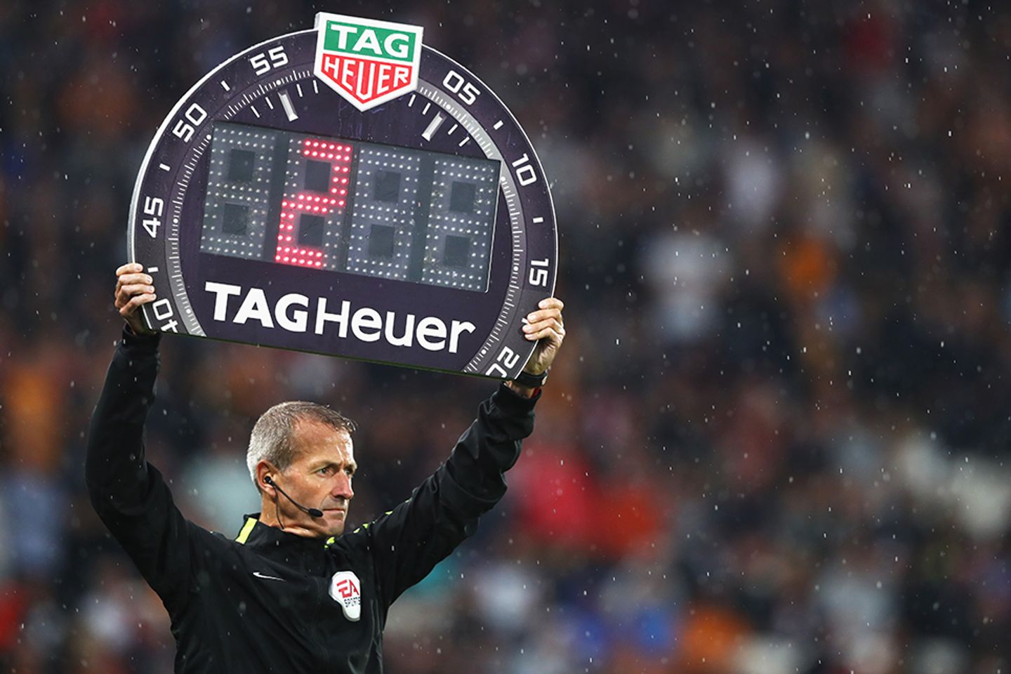 Match official holds TAG Heuer board