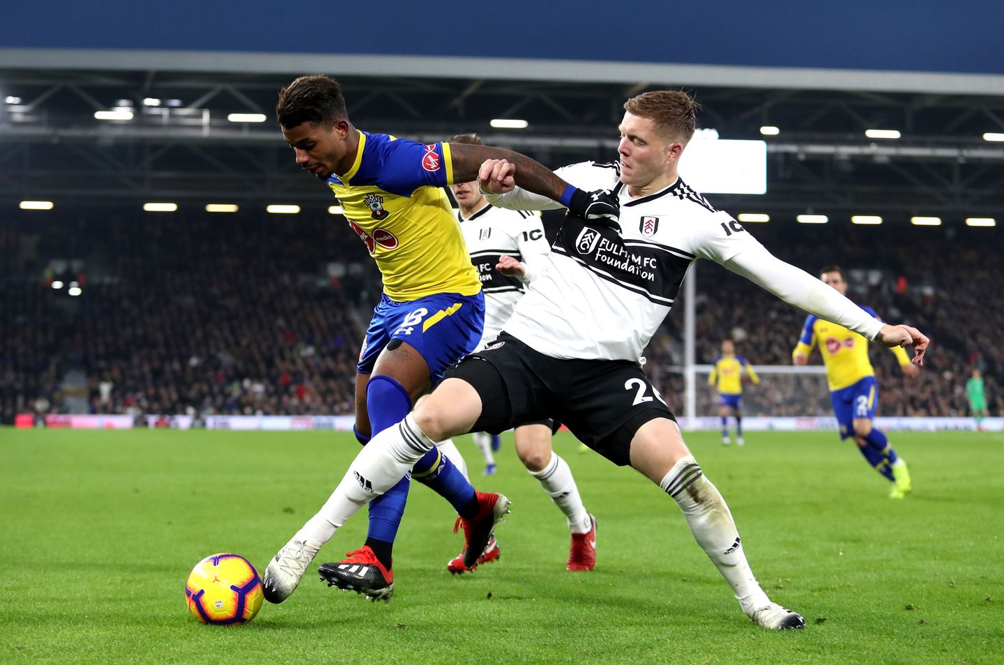 Mario Lemina of Southampton battles with Fulham's Alfie Mawson