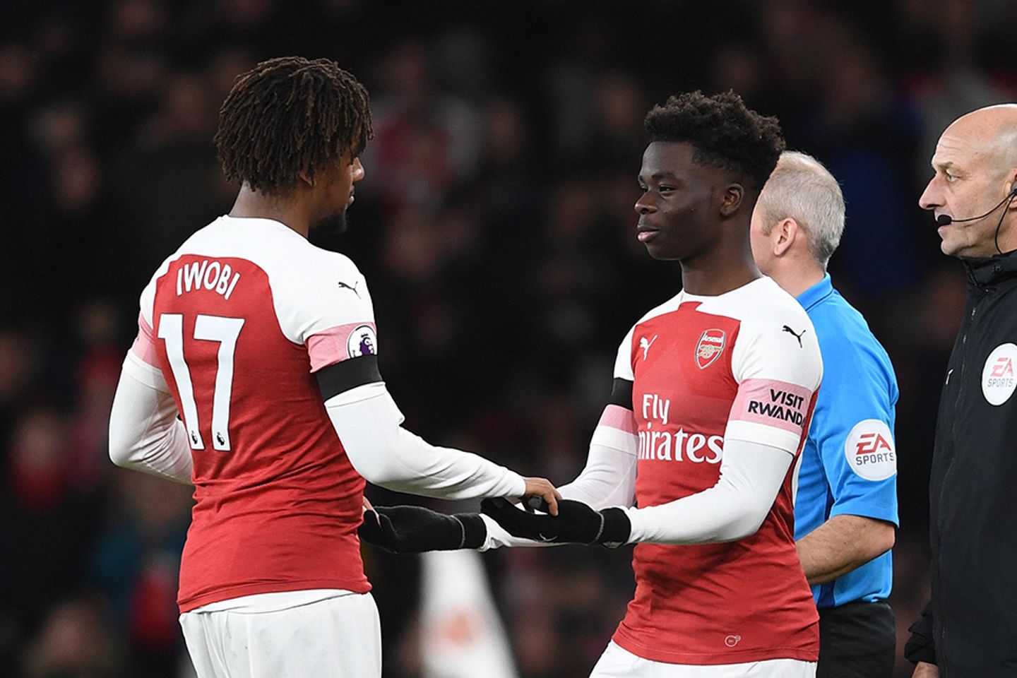 Arsenal's Bukayo Saka comes on for Alex Iwobi