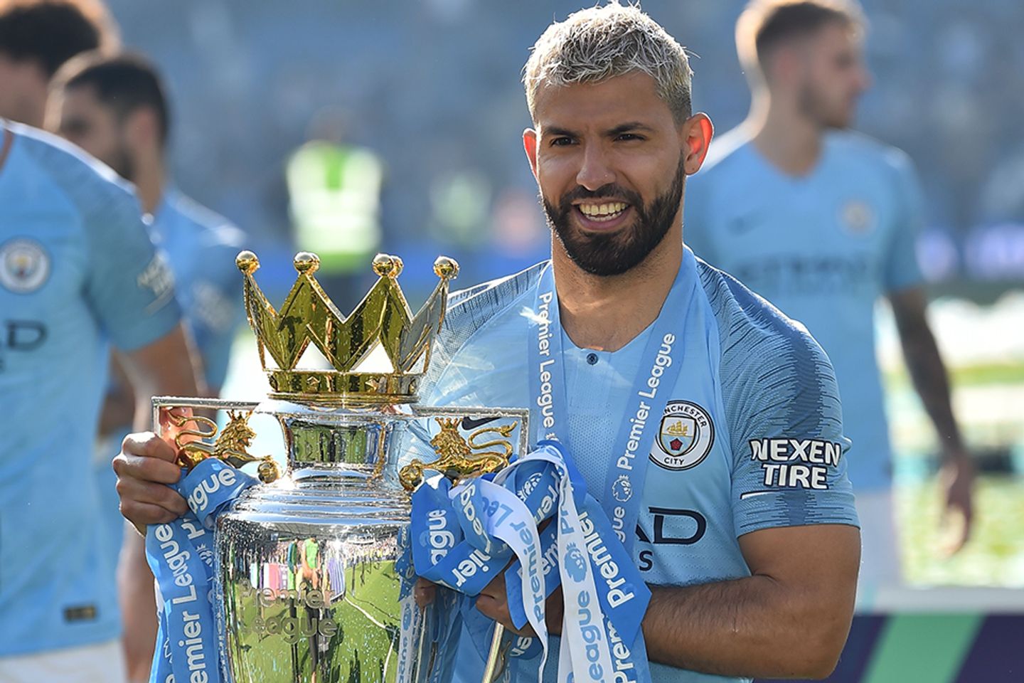 Sergio Aguero, Manchester City, with the Premier League Trophy