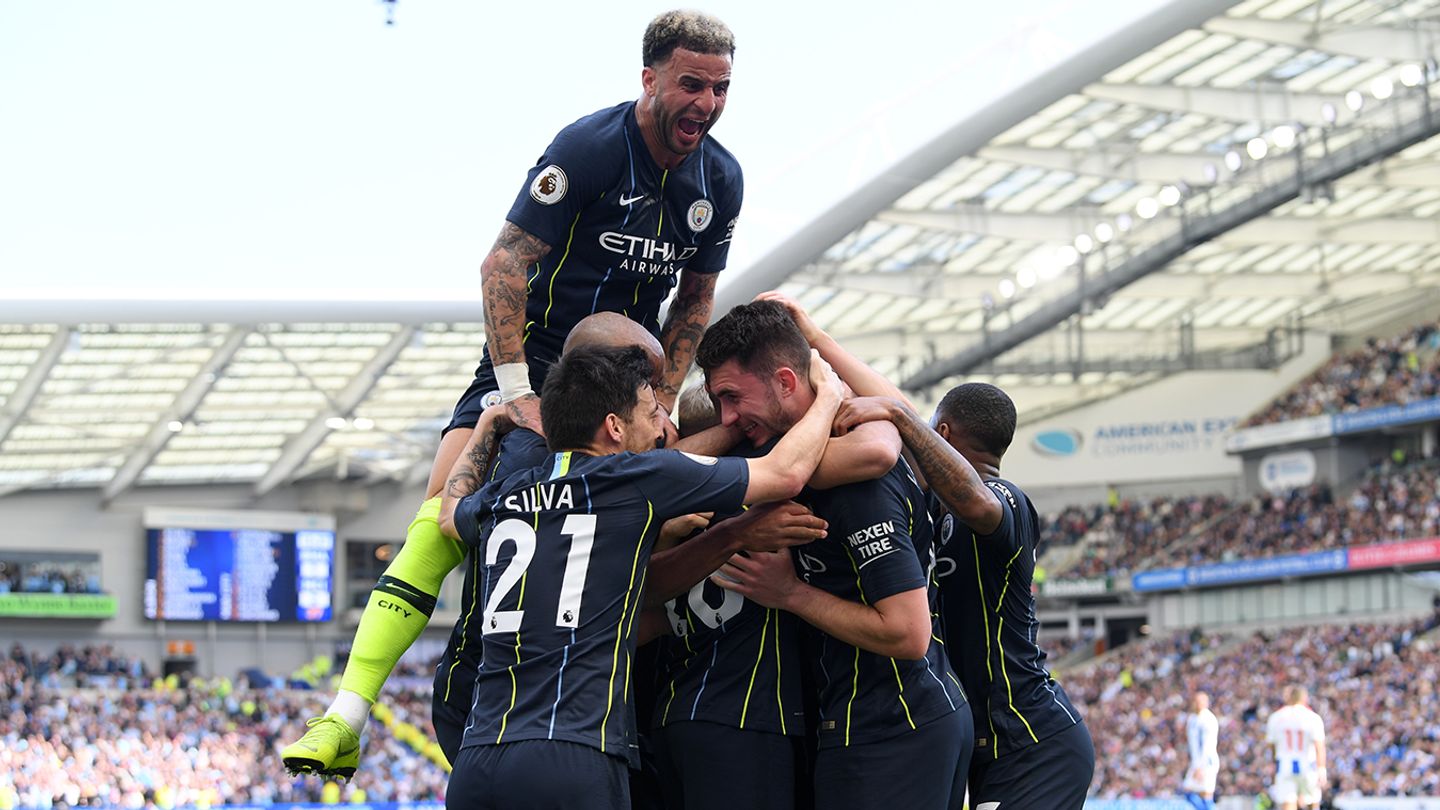 Man City celebrate scoring a goal