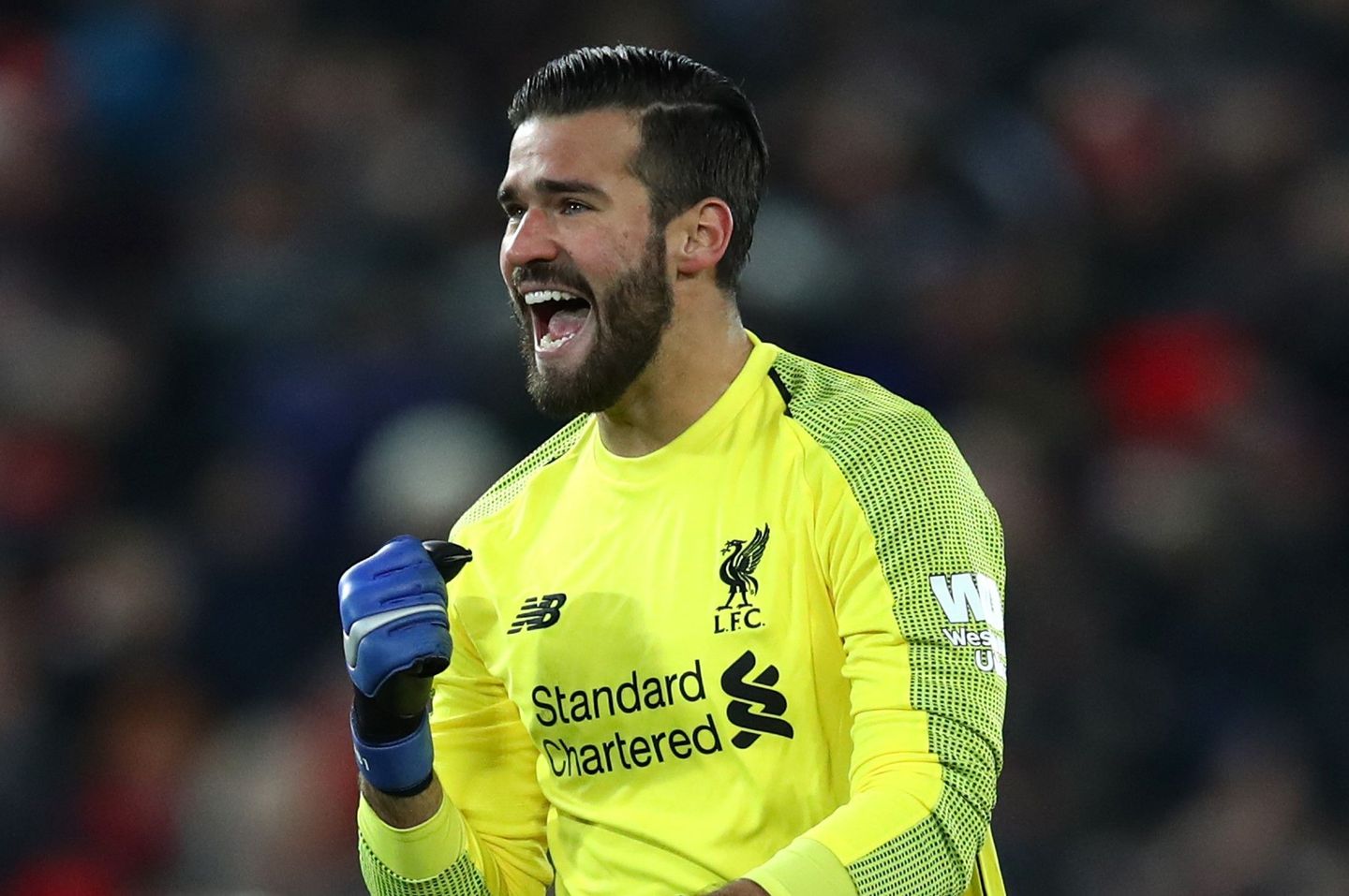 Alisson celebrates