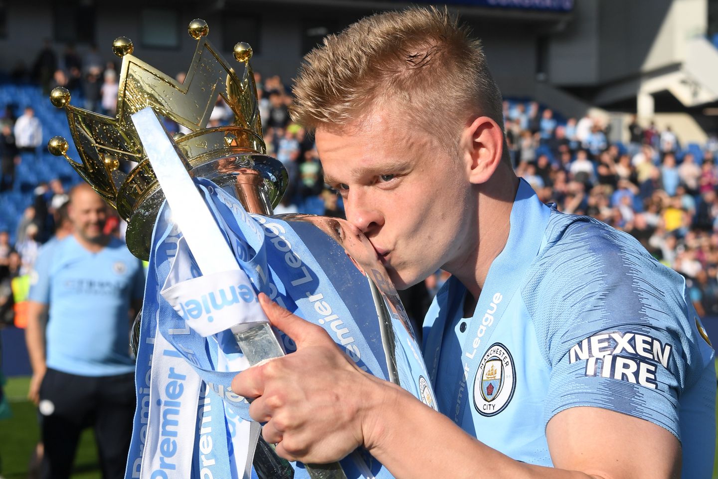 Man City's Oleksandr Zinchenko kisses Premier League Trophy