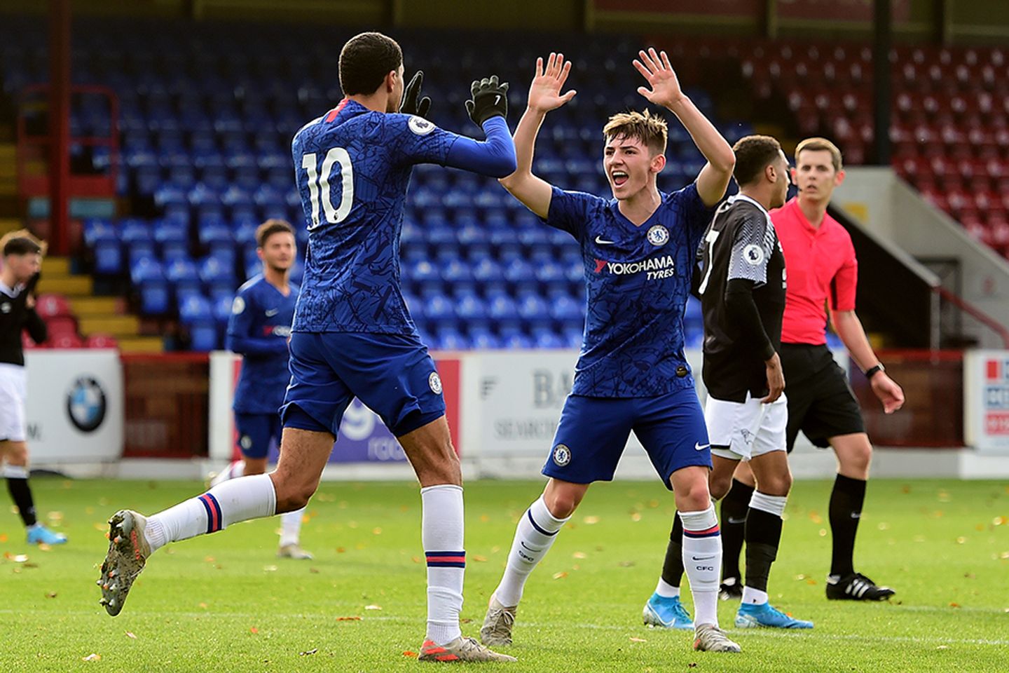 Billy Gilmour celebrates a Chelsea team-mate's goal in PL2