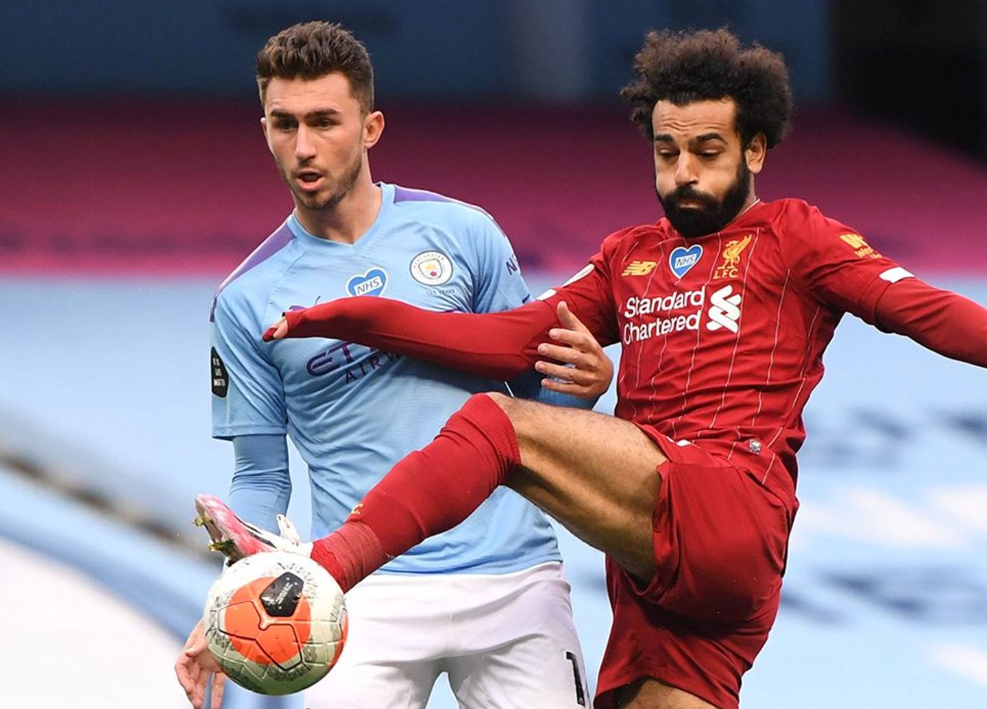 Mohamed Salah, Liverpool, and Aymeric Laporte, Manchester City