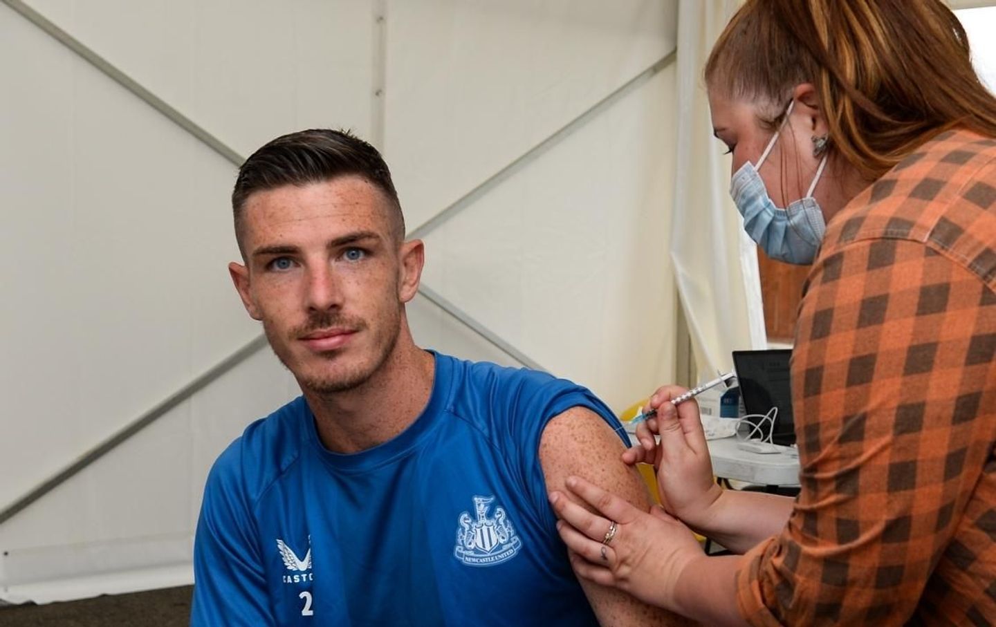 Ciaran Clark receives a vaccine