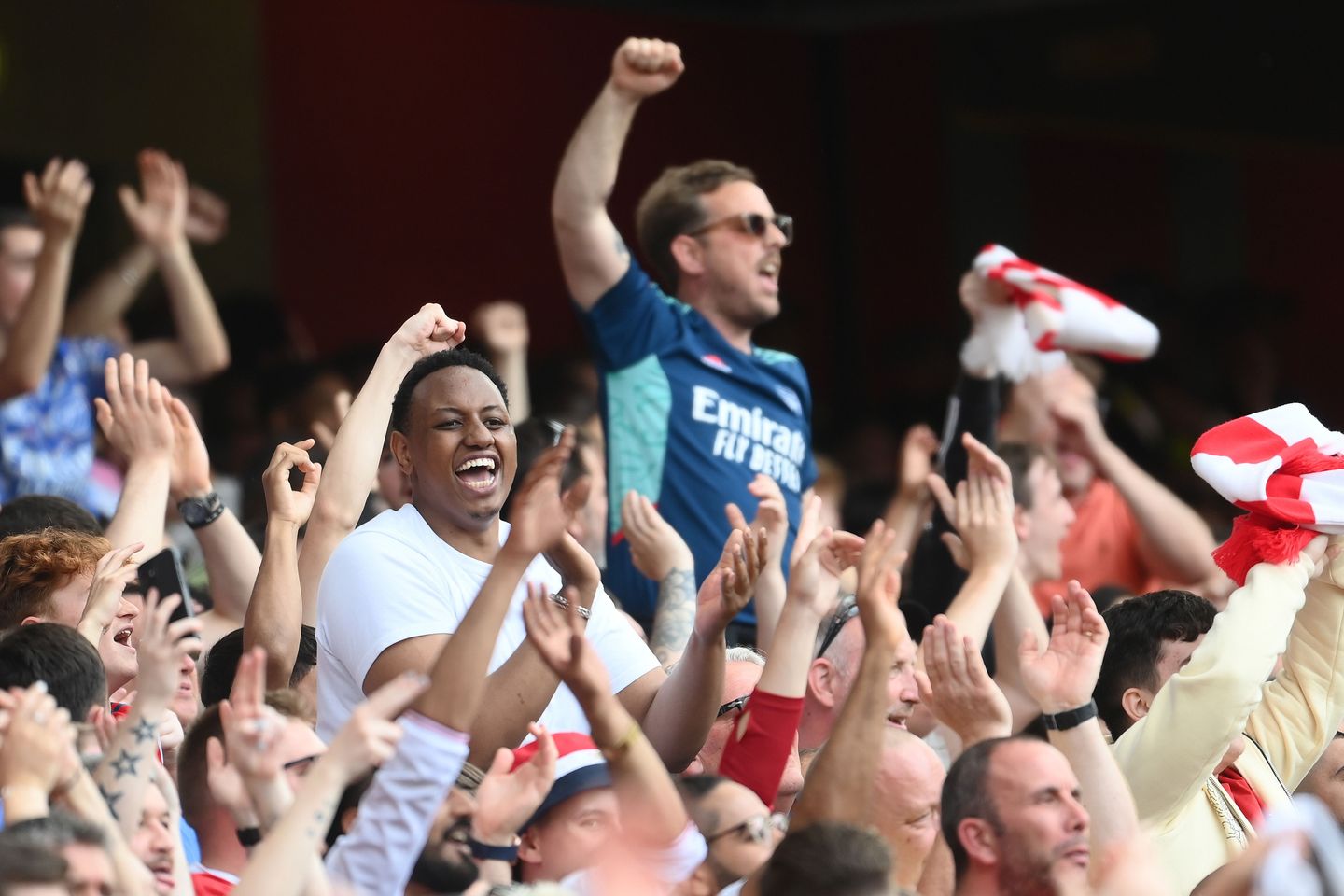 Arsenal fans celebrate v Everton