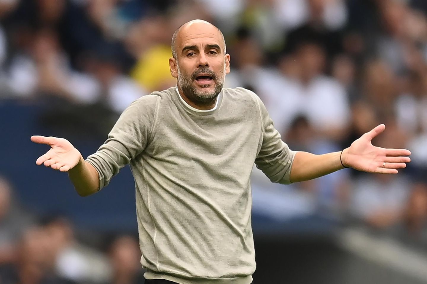 Pep Guardiola gestures at Spurs v Man City