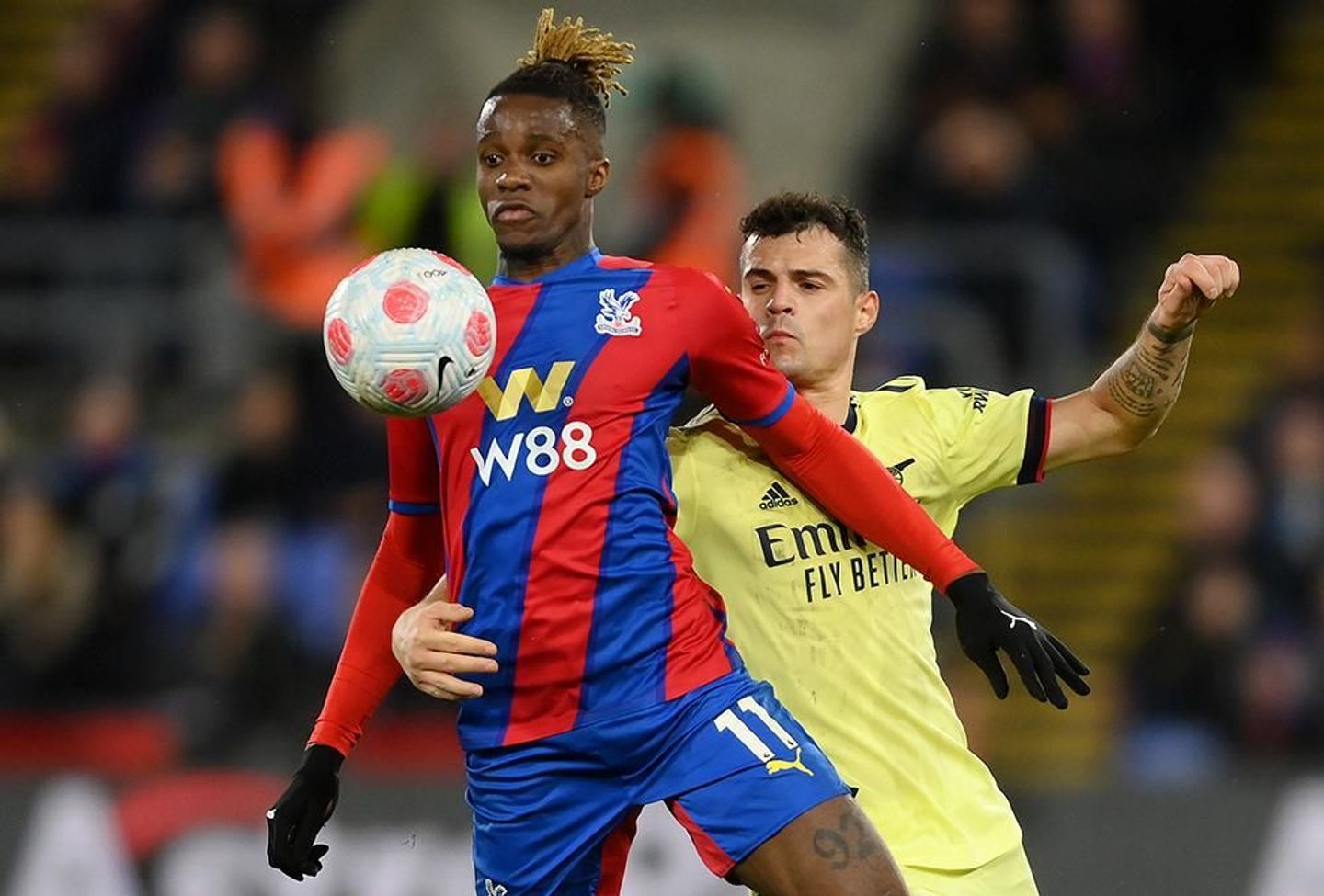 Wilfried Zaha, Crystal Palace, and Granit Xhaka, Arsenal