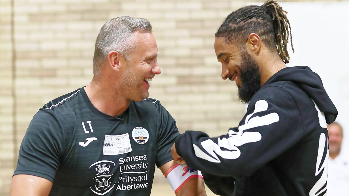 Ashley Williams awards Lee Trundle Community Captain, w