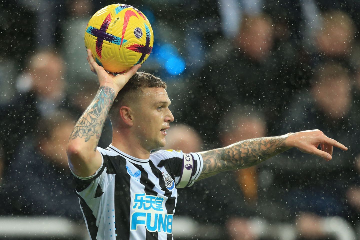 Newcastle United defender Kieran Trippier prepares to take a throw-in