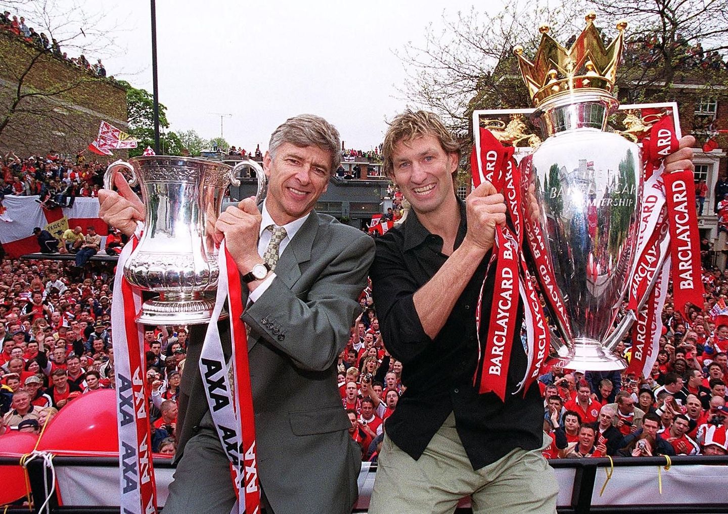 Tony Adams and Arsene Wenger with the FA Cup and Premier League trophy
