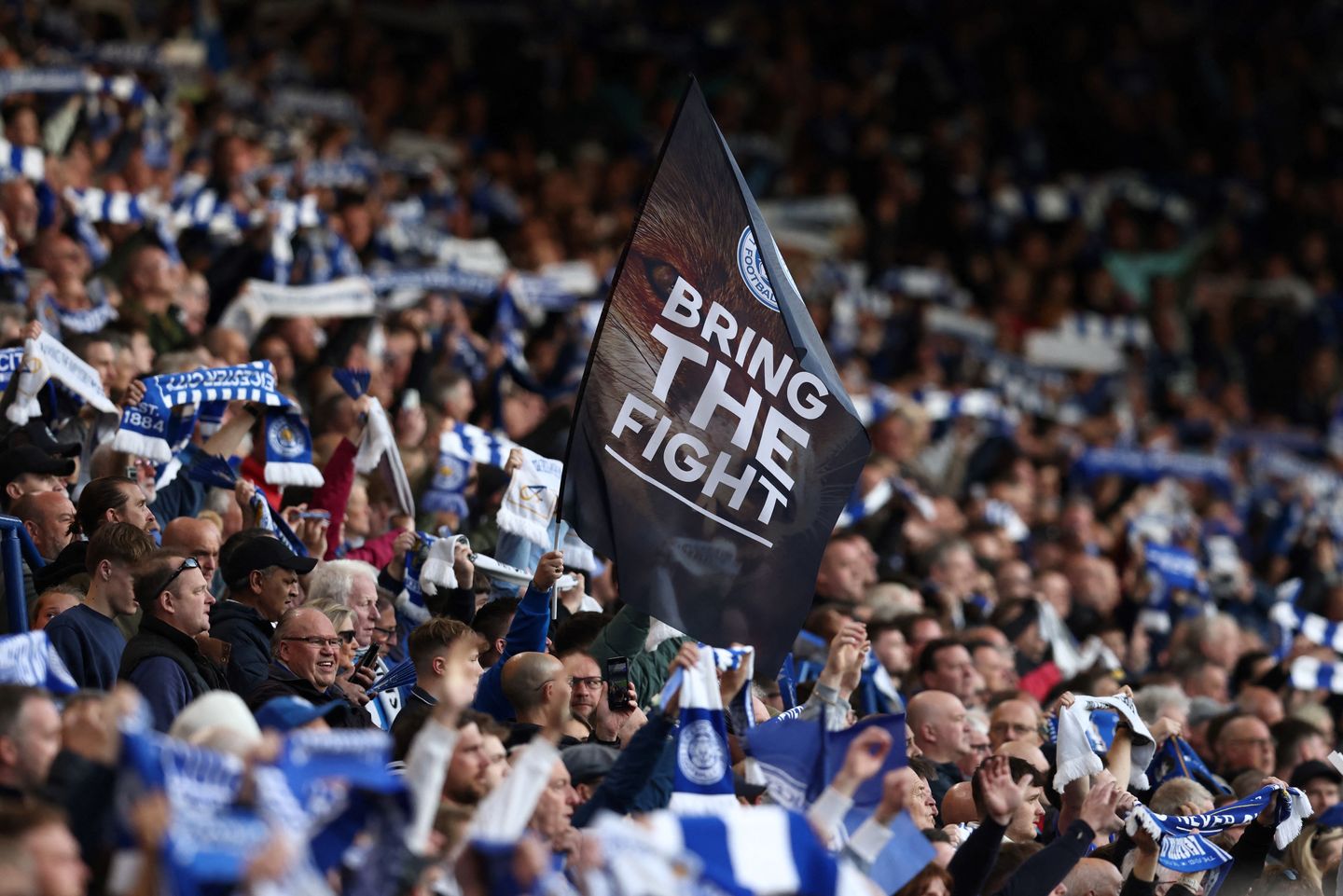 Leicester City fans with a banner