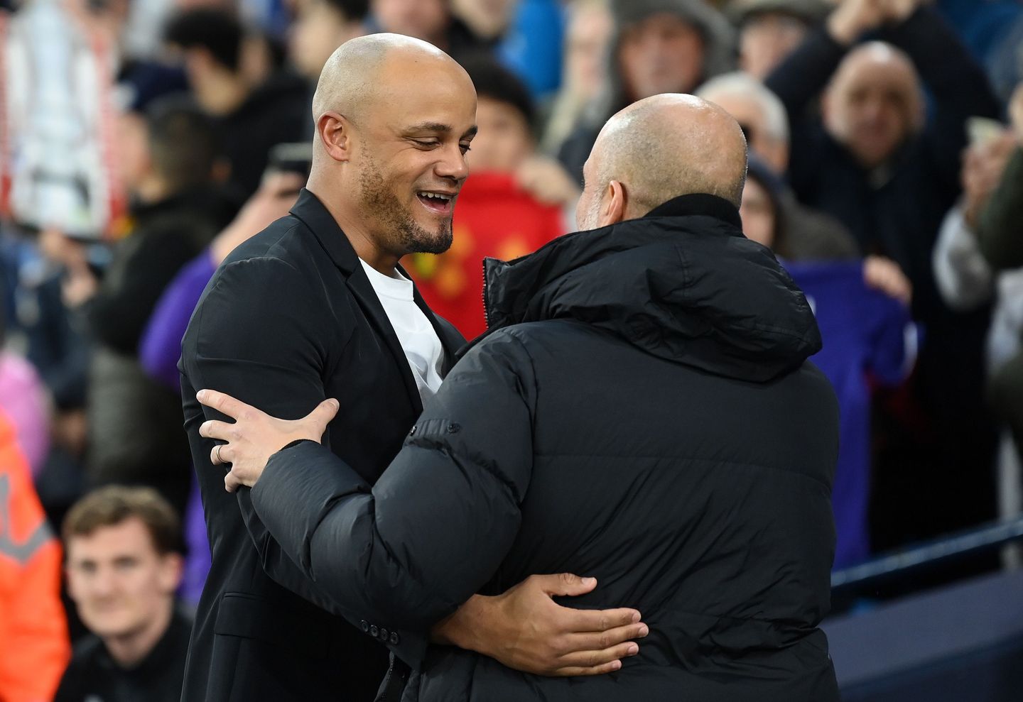 Vincent Kompany greets Pep Guardiola
