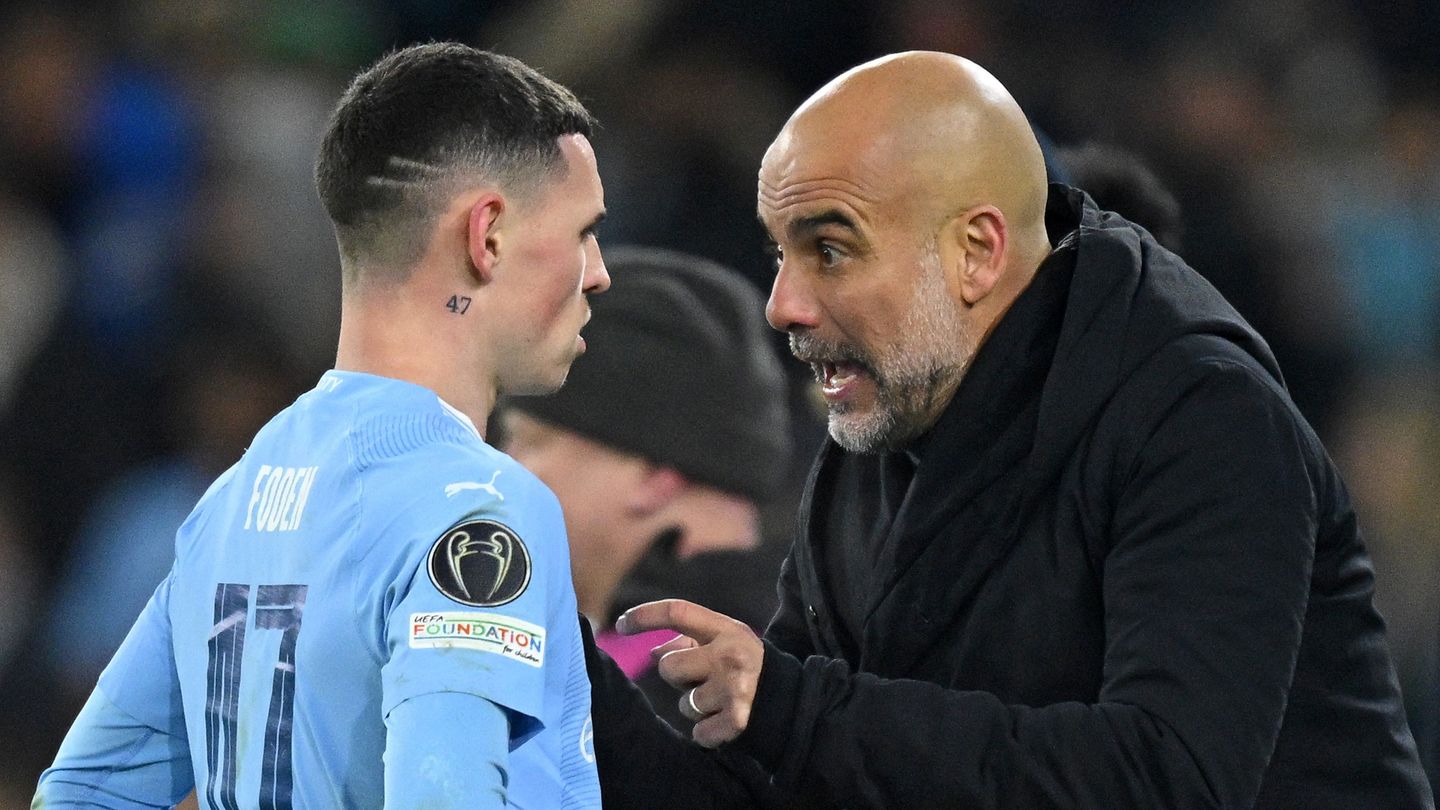 Pep Guardiola and Phil Foden