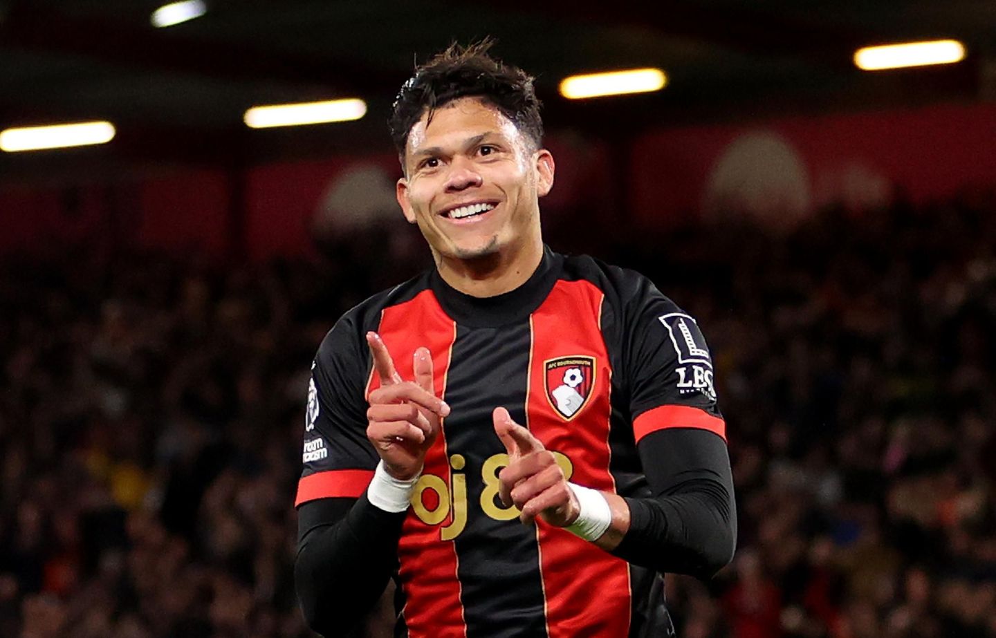 Evanilson celebrating in a Bournemouth shirt at the Vitality Stadium