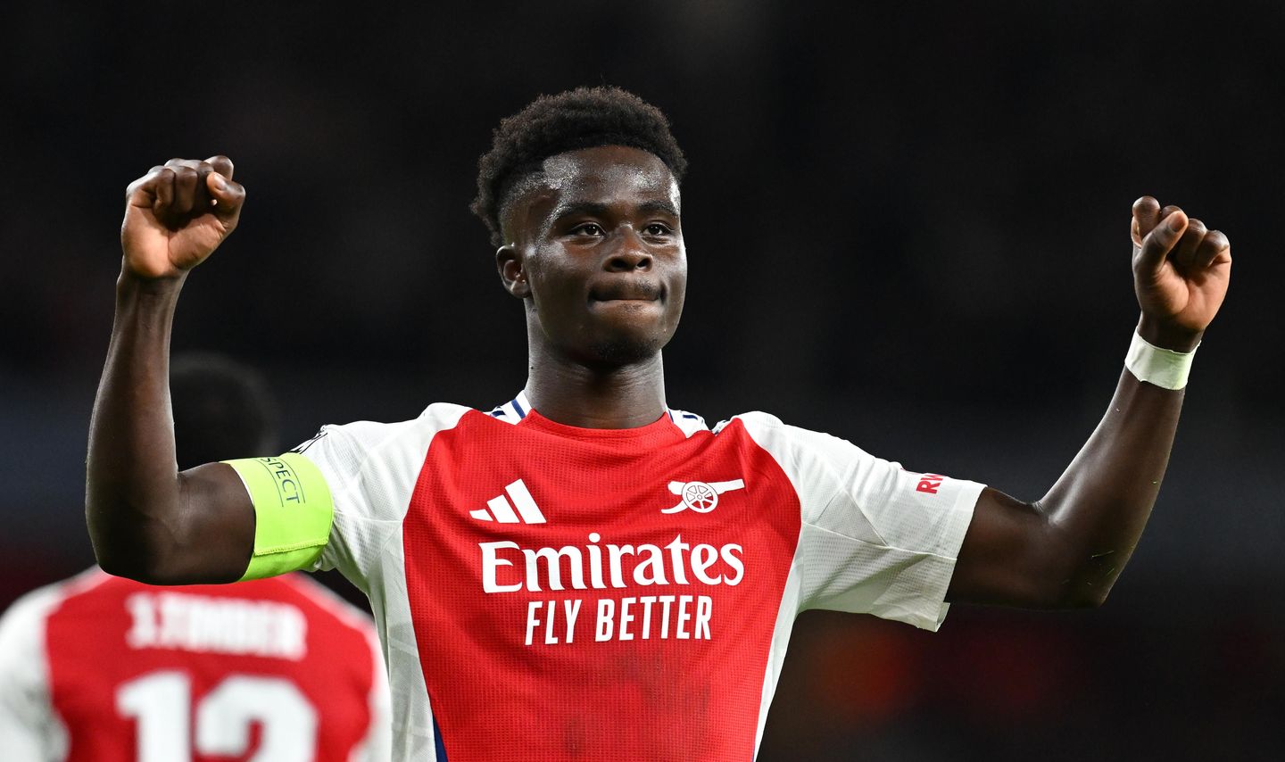 Bukayo Saka celebrates during Arsenal v PSG
