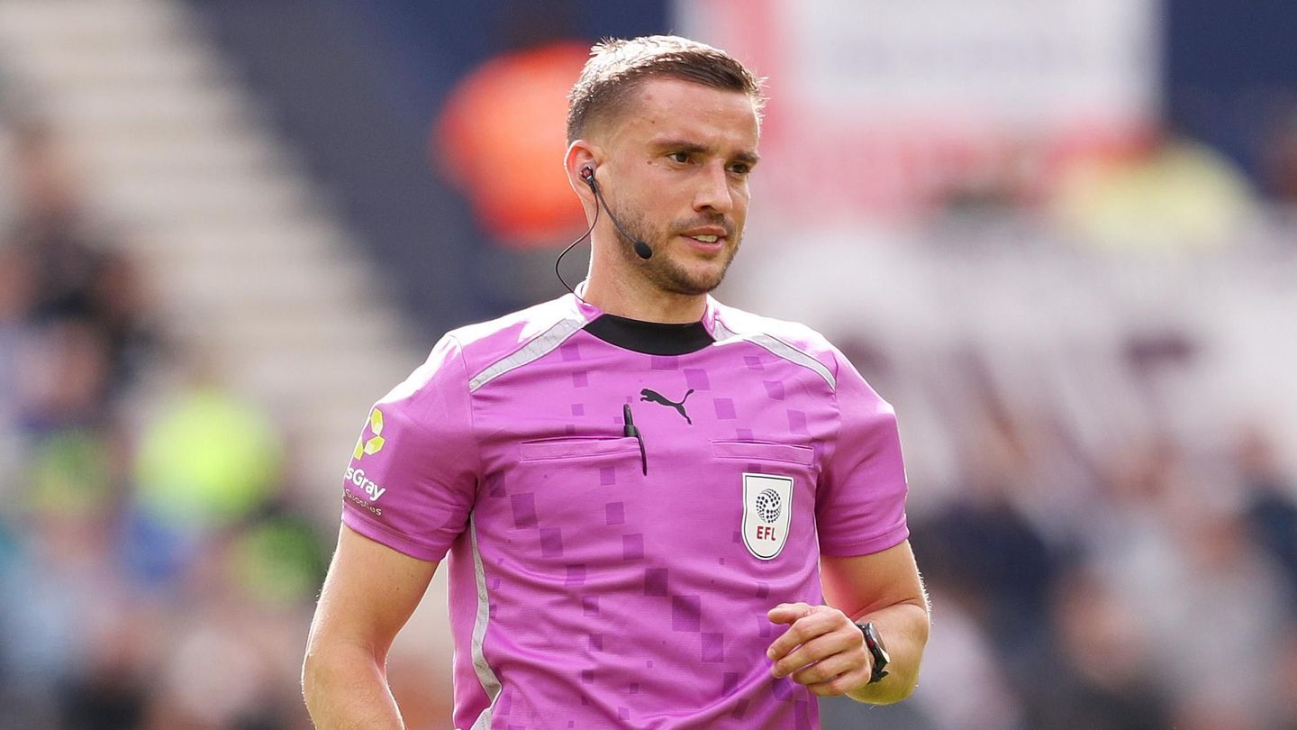 Referee Tom Kirk officiating an EFL match