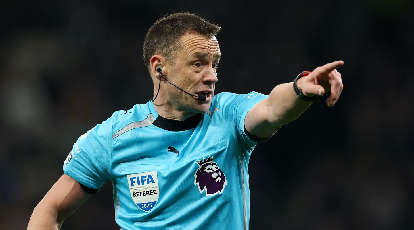 Referee Stuart Attwell points his finger