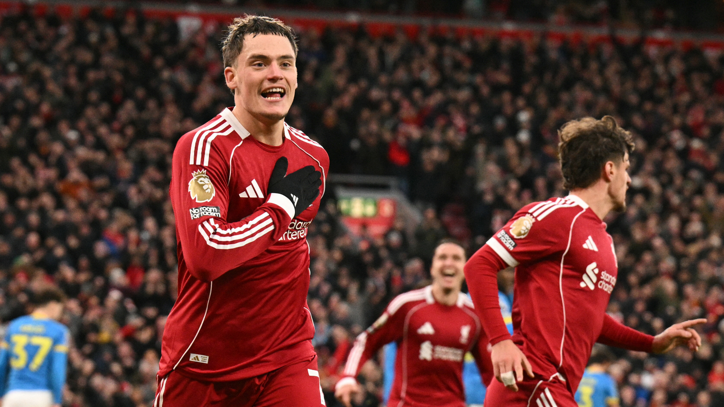 Florian Wirtz celebrates his first Liverpool goal, against Wolves at Anfield, with Federico Chiesa in the background
