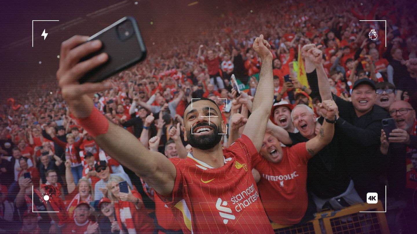 Mohamed Salah takes a selfie with Liverpool fans