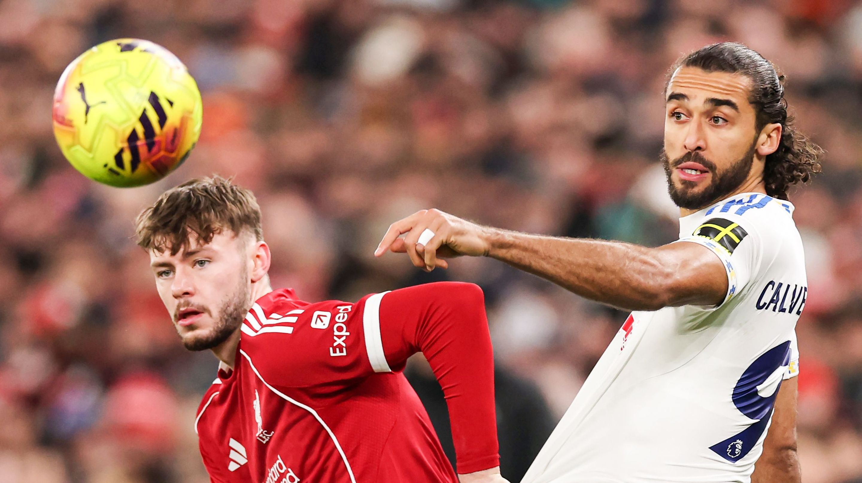 Leeds United's Dominic Calvert-Lewin battling for possession, a key FPL Gameweek 20 transfer target.