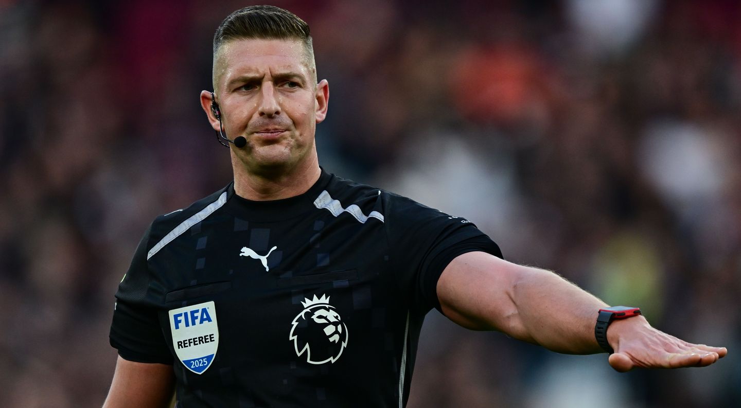 Referee Rob Jones gestures
