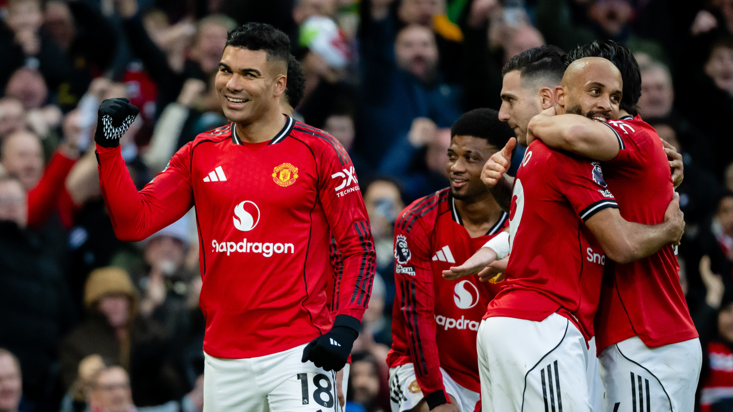 Casemiro celebrates a goal at Old Trafford with Manchester United team-mates Amad and Diogo Dalot and Bryan Mbeumo