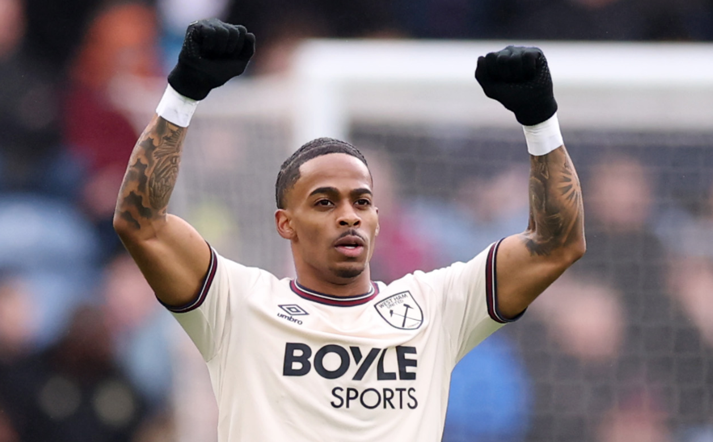 Crysencio Summerville holds up his arms after scoring for West Ham against Burnley at Turf Moor