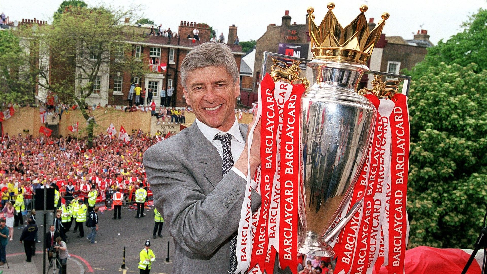 Arsene Wenger with the Premier League Trophy
