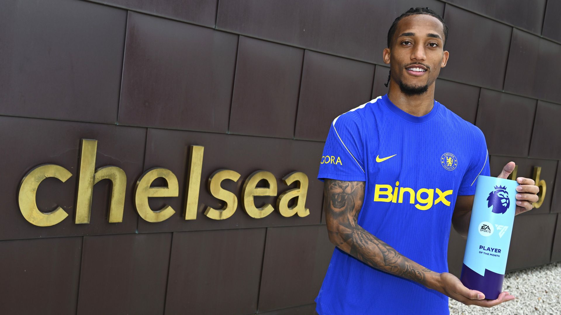 Joao Pedro with his EA SPORTS Player of the Month award