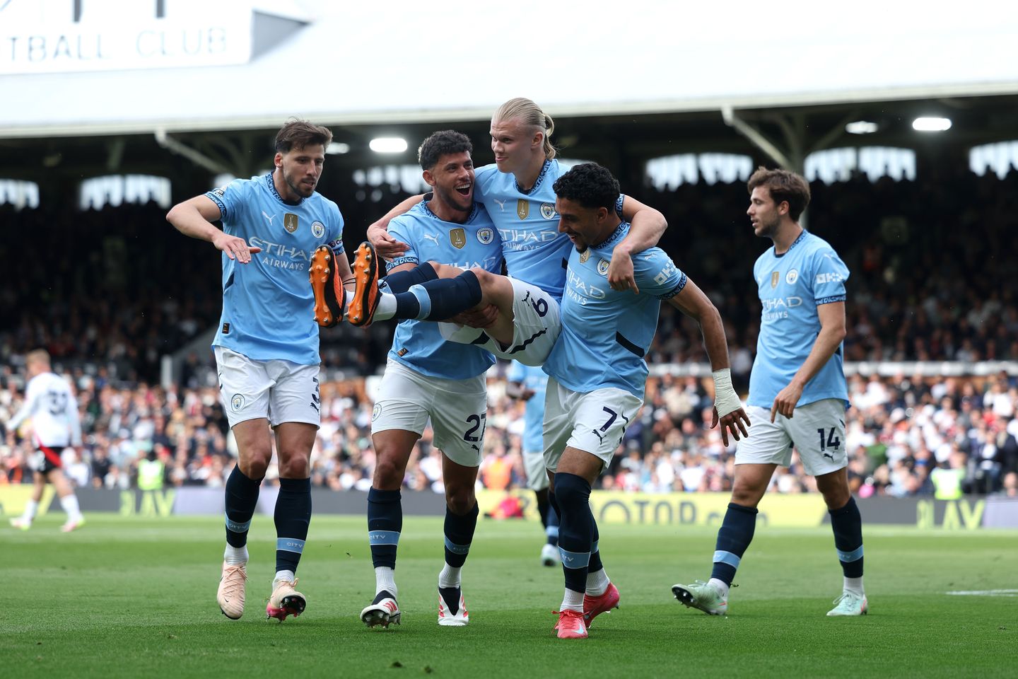 Man City clinch Champions League spot with victory over Fulham