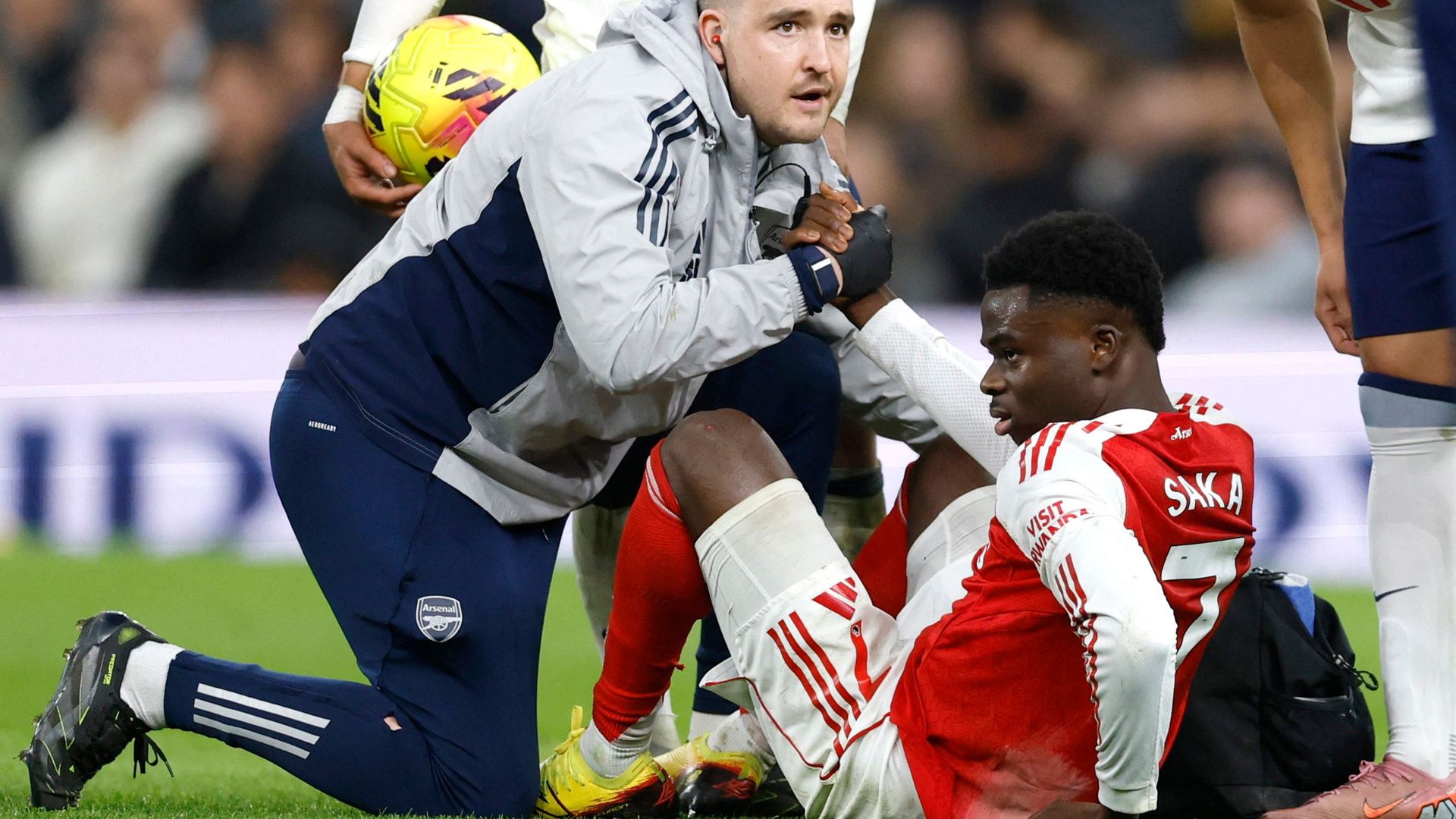 Bukayo Saka receives treatment